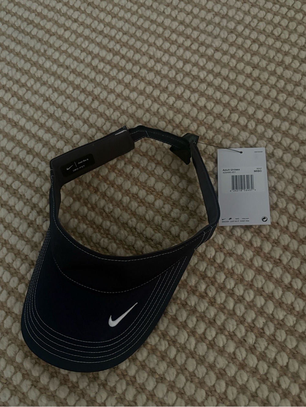 Nike Navy Blue Visor with White Swoosh and Contrast Stitching